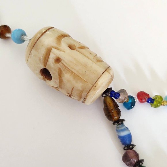 Unique carved stone face statement glass beaded necklace - Picture 14 of 15